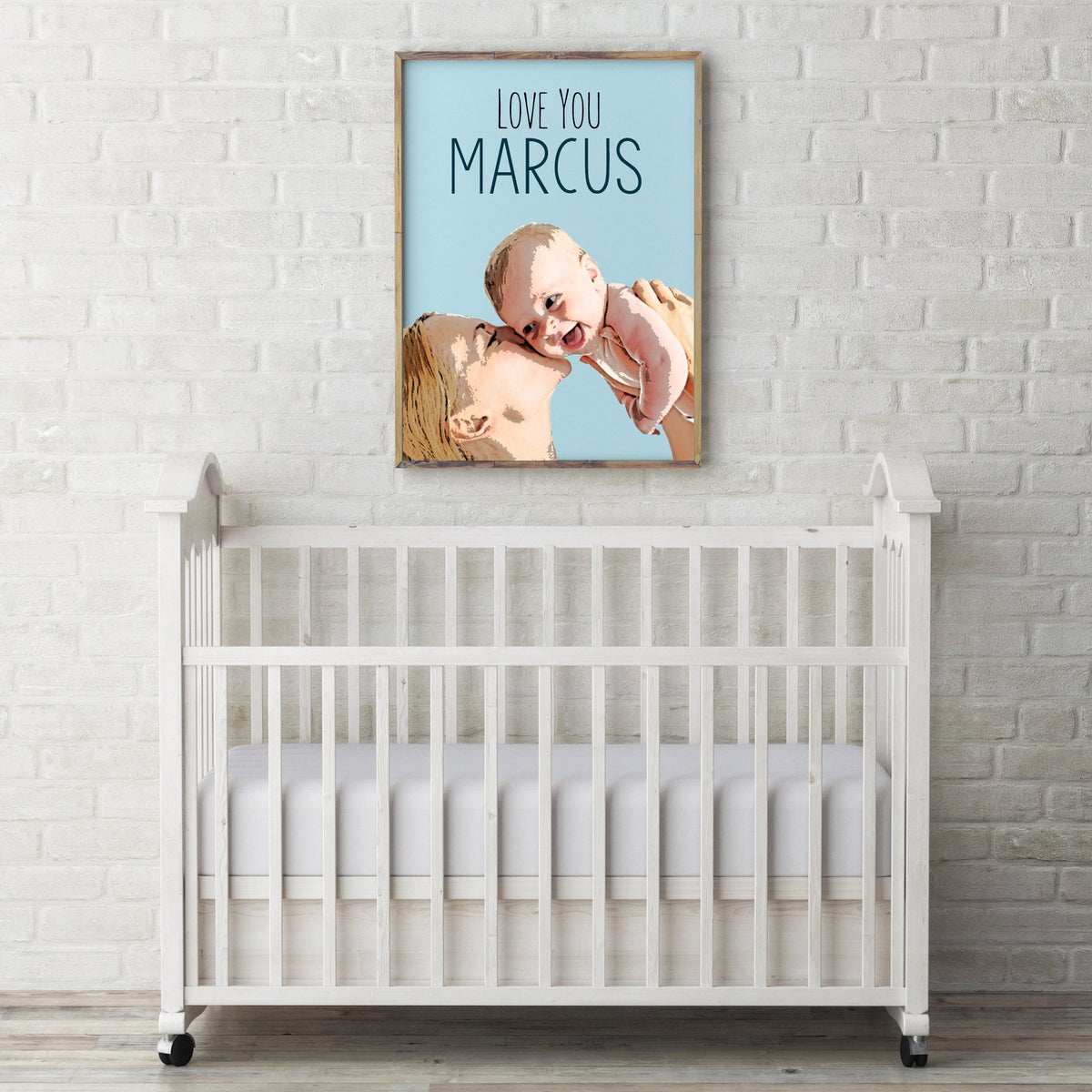 Pink Poster pop art of newborn baby boy displayed in a white nursery