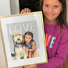 Adorable little girl showing her custom kid poster with her doggie